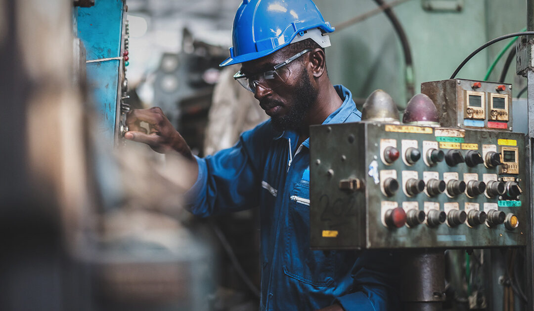 Man working on feet in a factory